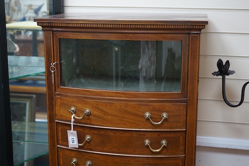 An Edwardian satinwood banded mahogany bowfront sheet music cabinet, width 61cm, depth 44cm, height 143cm